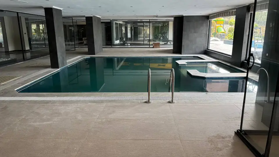 Indoor pool with a jacuzzi