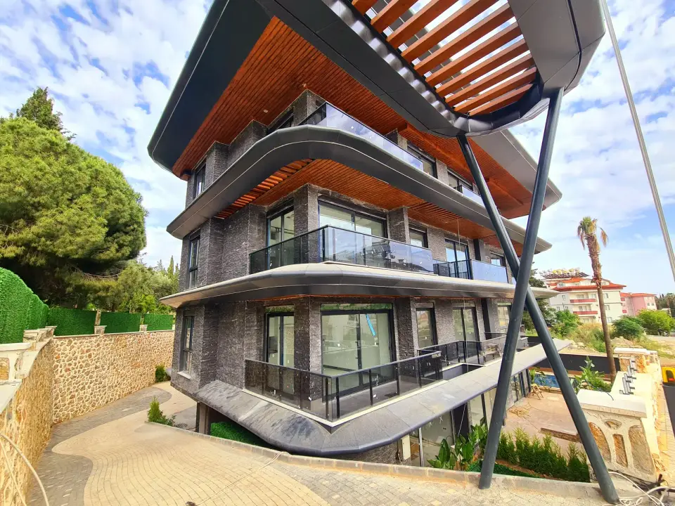 The building facade with a wooden pergola