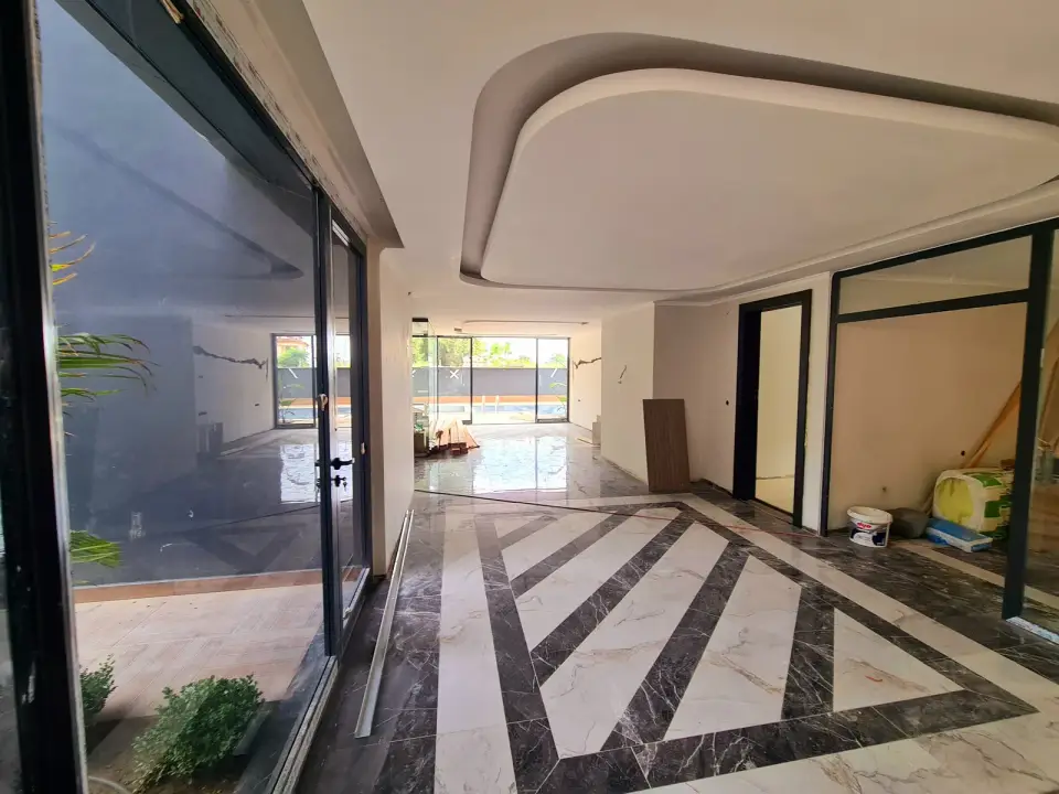 A spacious lobby with a marble floor