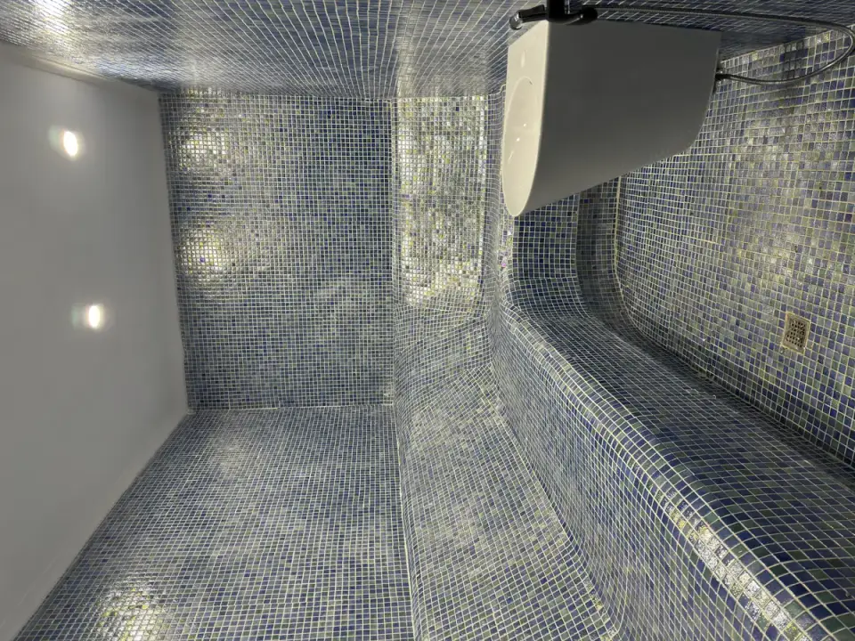 Steam room with mosaic tiles