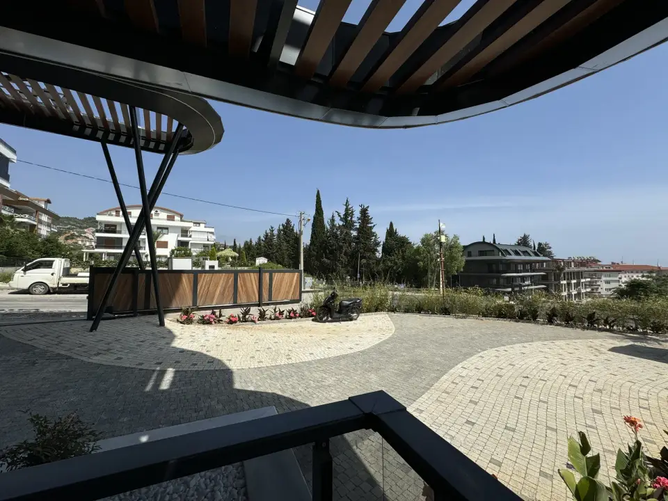 An apartment terrace overlooking the grounds
